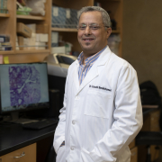 Lbachir BenMohamed photo inside his research lab